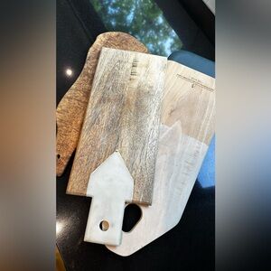 Three wooden cutting boards (used in good condition) for $75!